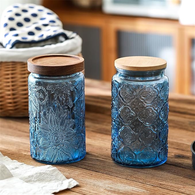 ANSQU Set of 2 Vintage Blue Glass Storage Jars with Wood Lids, 34oz Kitchen Canisters for Coffee, Sugar, Cookies, Candy – Decorative Pantry Organizers (Blue 2, 34 Ounces)